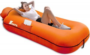 A girl sleeping on the best outdoor inflatable lounger 